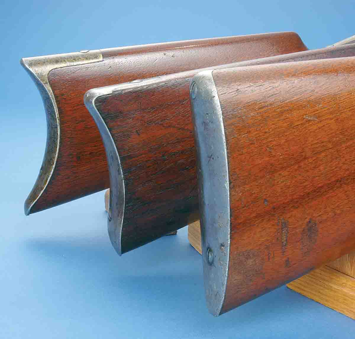 Throughout the late nineteenth and early twentieth centuries, Winchester used three standard buttplate versions. Front is shotgun, center is carbine and rear is rifle.